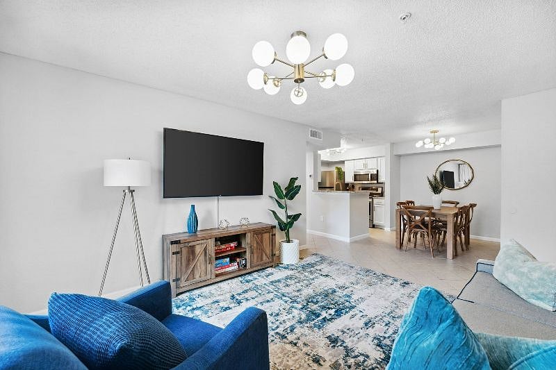 Bright airy beach condo with Smart TVs and open living area