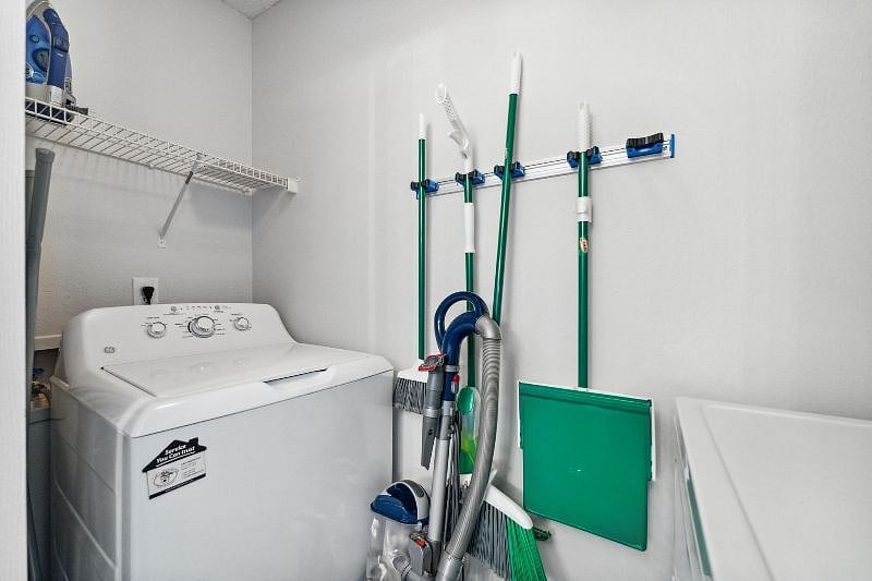 Private in condo laundry, new vacuum and cleaning tools
