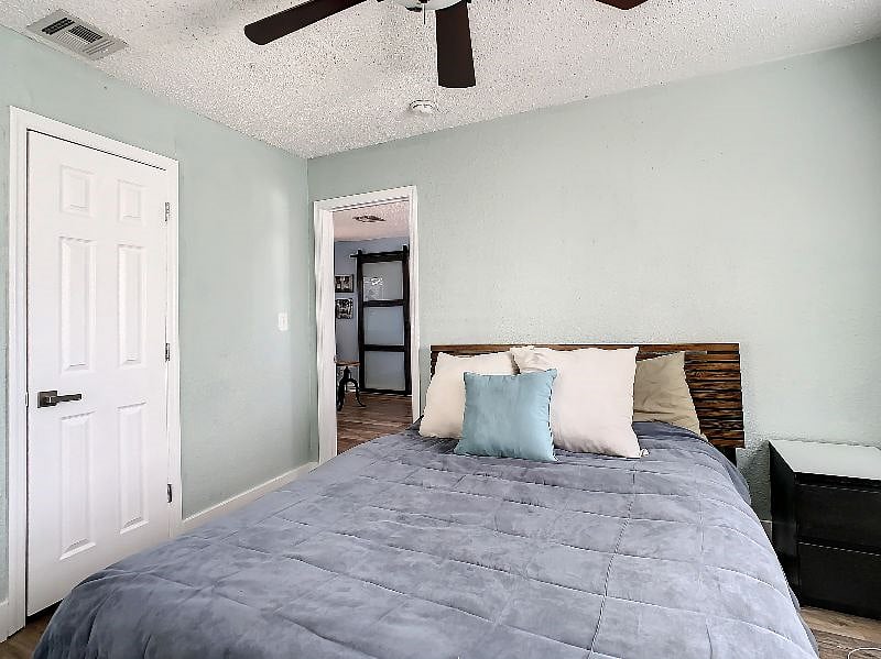 Bedroom #1 with walk-in closet and TV