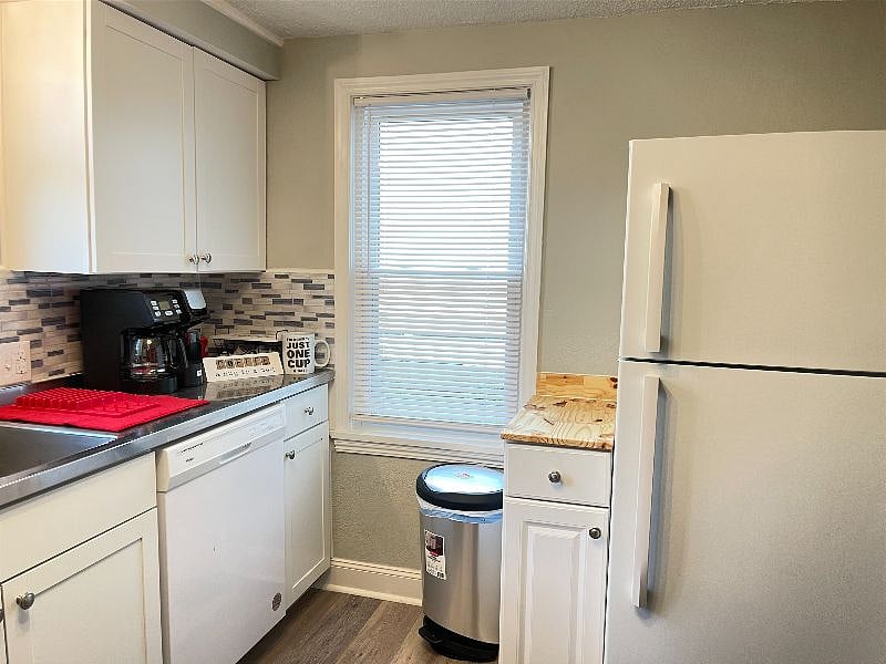full size fridge in the kitchen