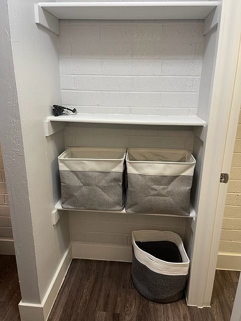 shelf storage area at entry of closet and bathroom, bins for linens/extra blanket, 8' extension cord, bathroom doesn't have an electrical outlet