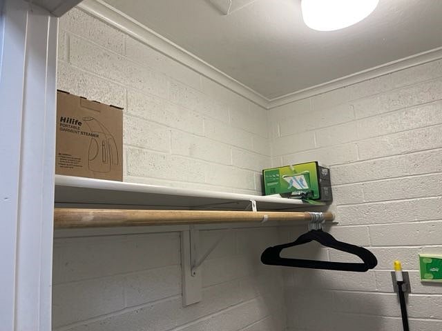 inside walk in closet, garment steamer, and swiffer refills, swiffer mop and broom