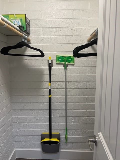walk in closet, broom, dust pan, swiffer