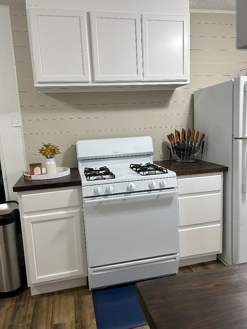 Stove area after painted cabinets