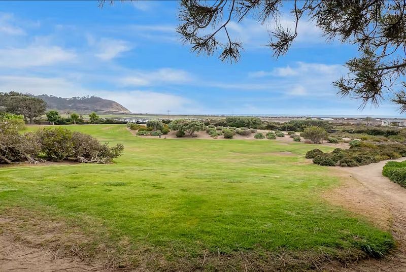 4 acre neighborhood park with lush, landscaping and a walking trail