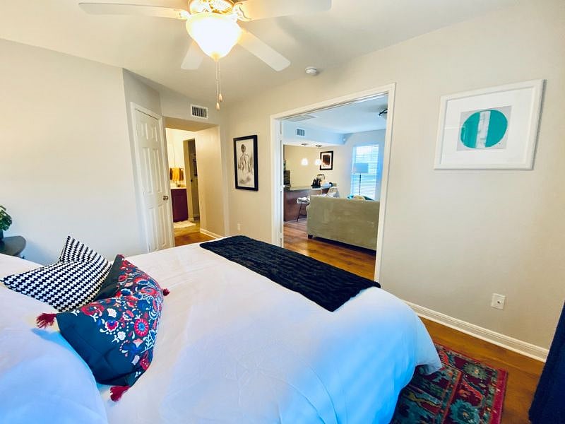 Bedroom with view into living room