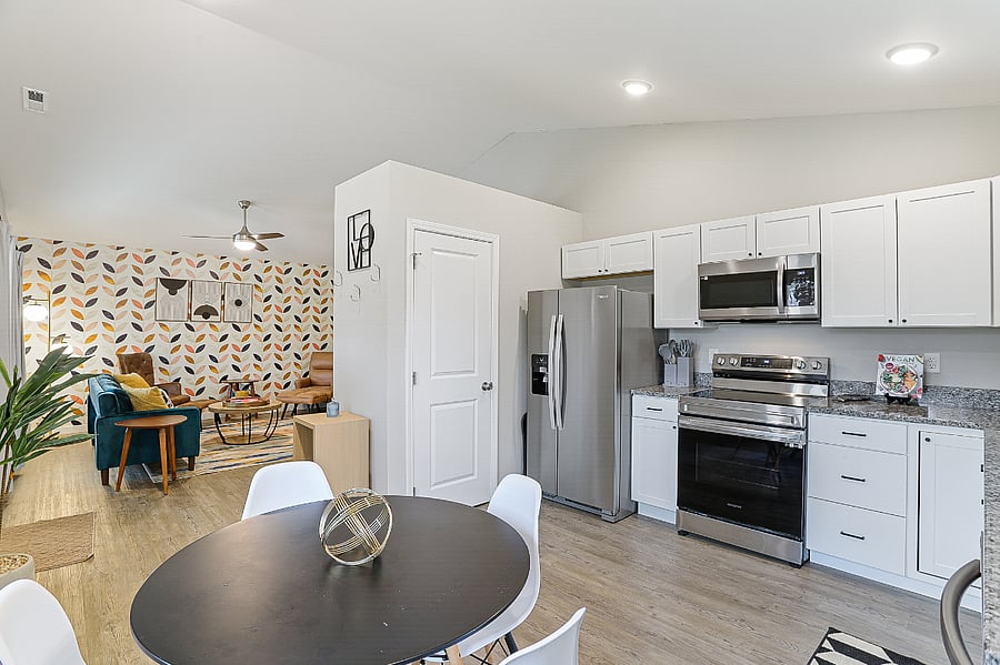 Dining table in the kitchen can accommodate 6 people comfortably.