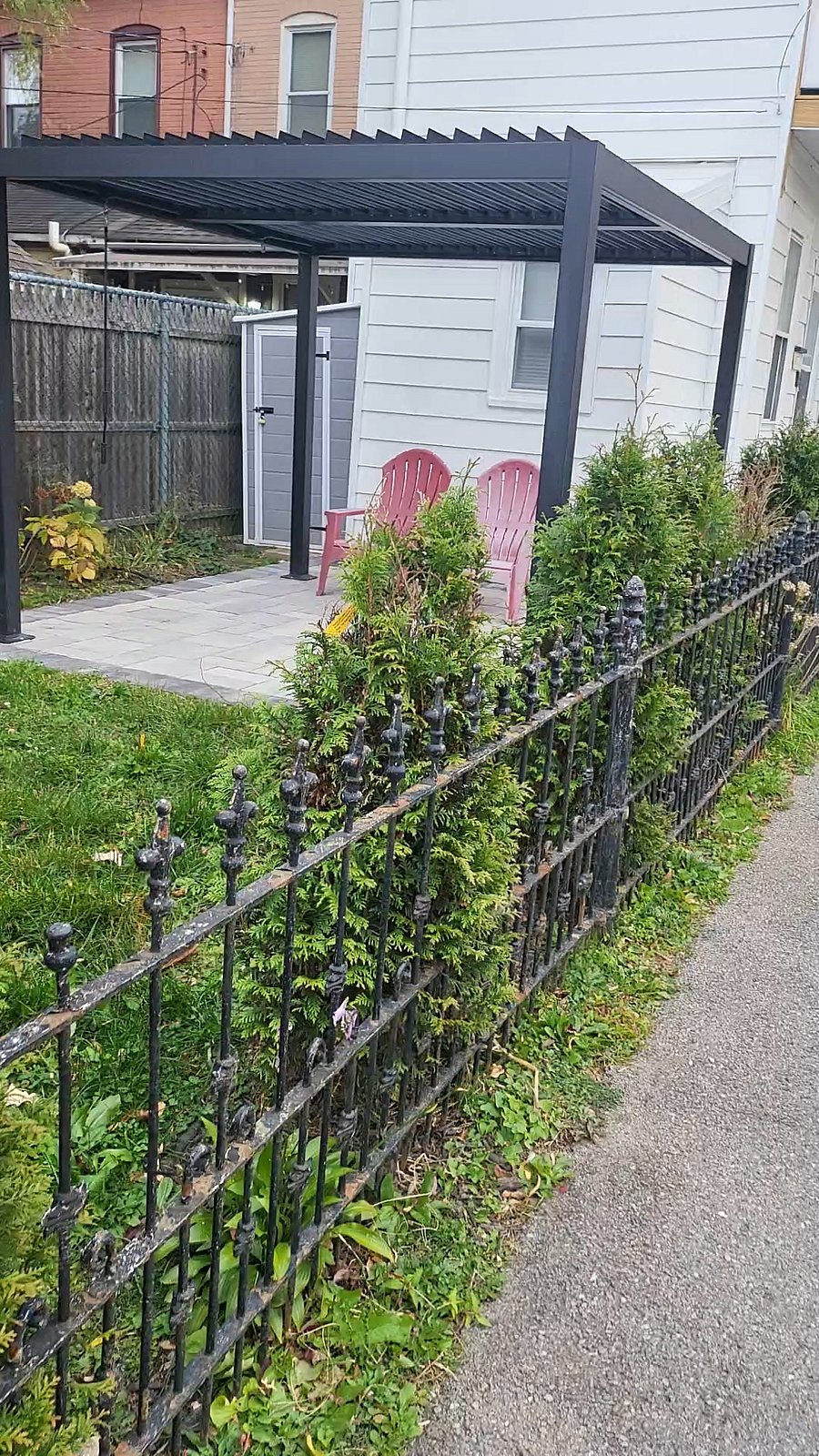 Fenced backyard patio and garden
