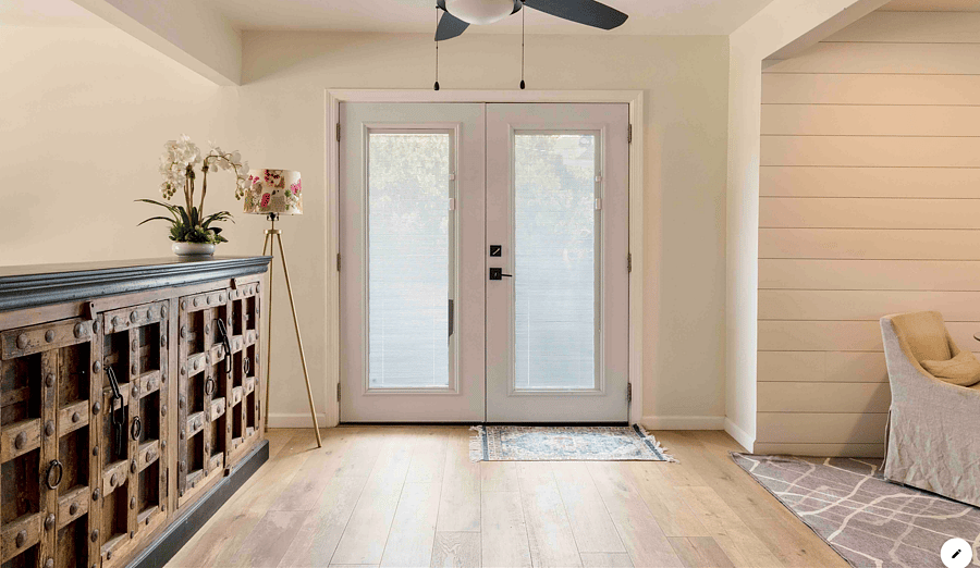 White double doors leading to the outdoor patio
