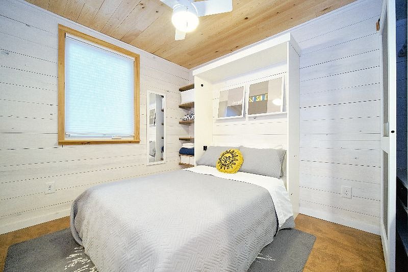 Second bedroom with full-sized wall bed down.