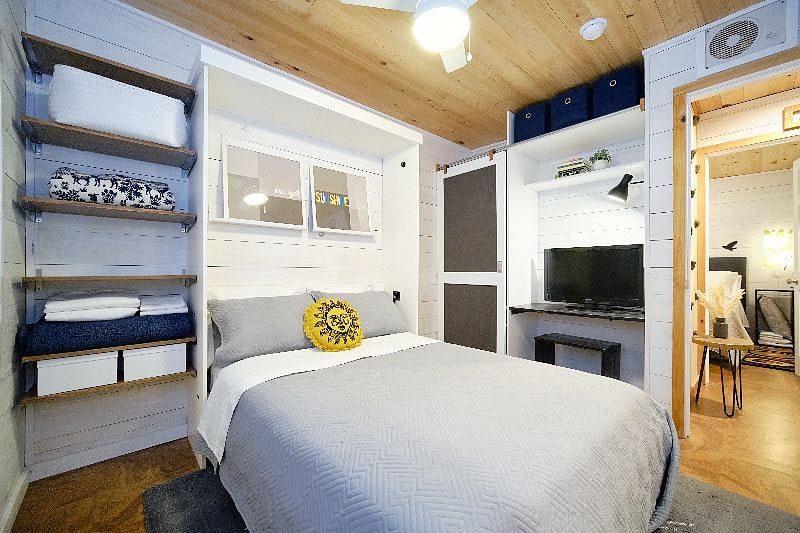 Second bedroom with full-sized wall bed down.