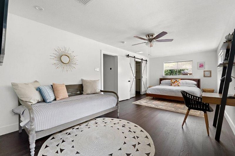 Enjoy this master bedroom with king bed and day bed and large closet