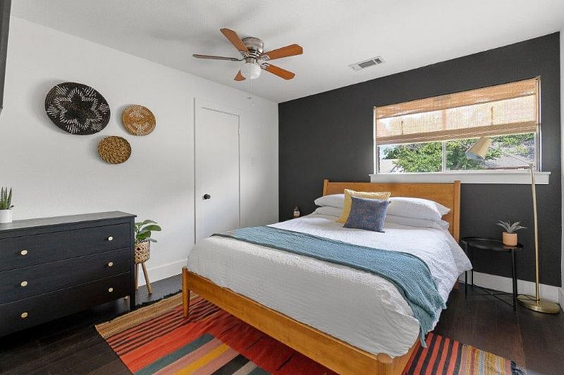 3rd bedroom includes queen bed, closet, drawers, and tv.