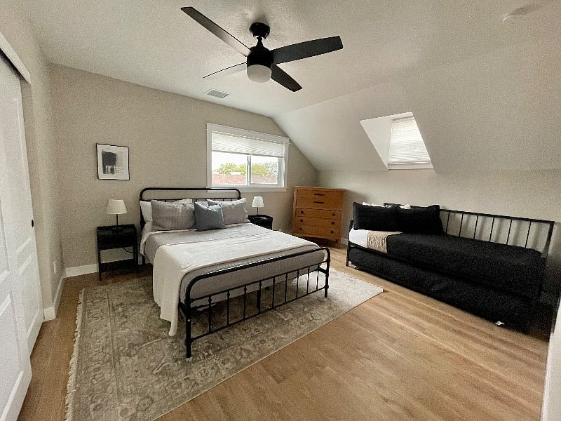 Upstairs bedroom with queen bed and twin trundle