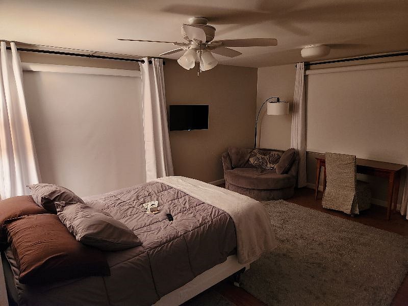 Bedroom with blackout shades down