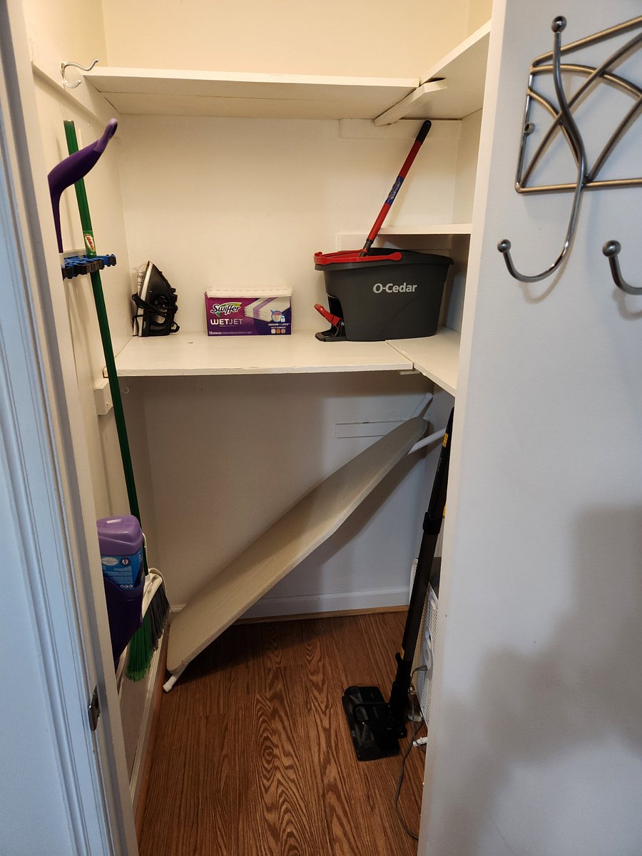 Coat closet and cleaning supplies closet. Vaccuum mop bucket broom ironing board step stool. We don't expect you to clean but spills happen and 3 months is a long time not to sweep....