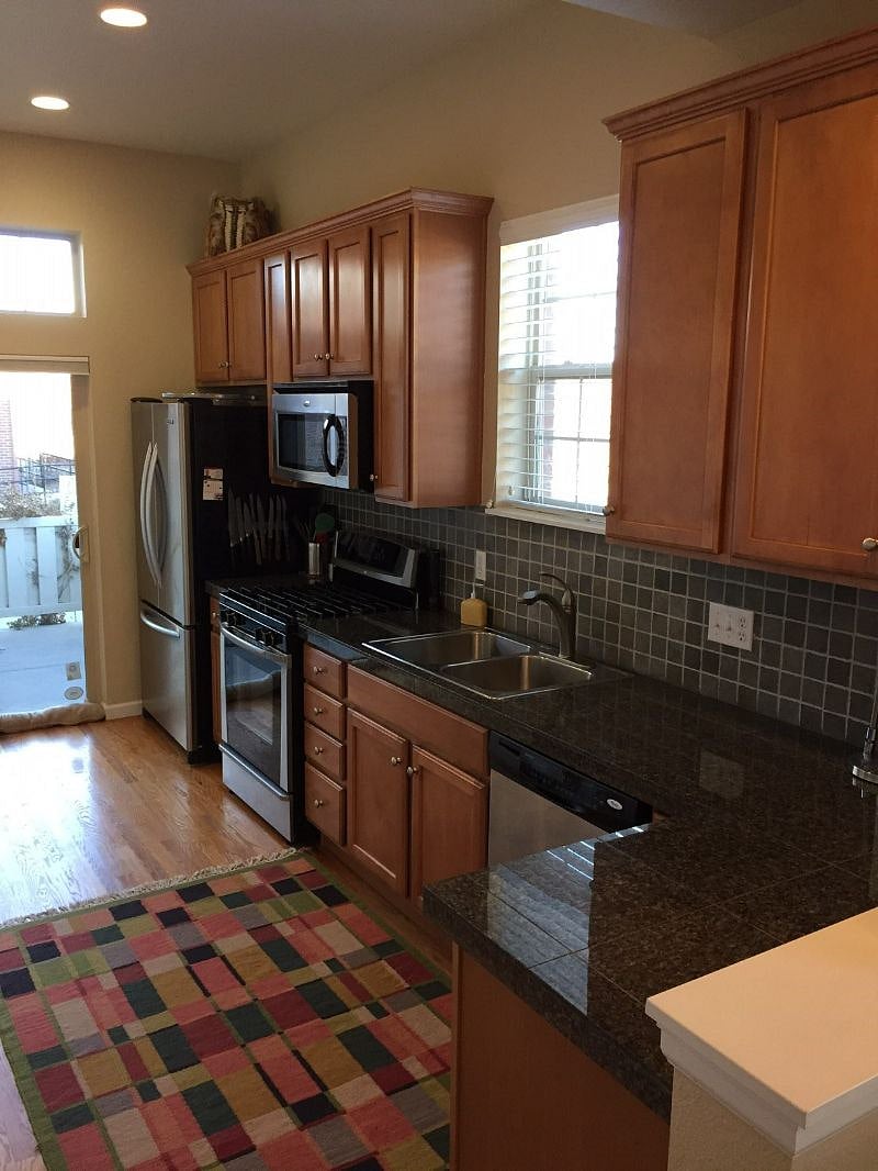 Full kitchen with view to small side patio