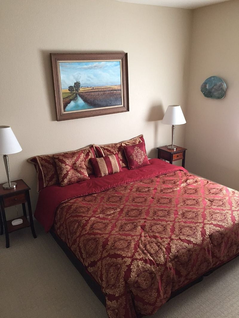 Master bed.  The lovely painting over the bed was painted by my grandmother.