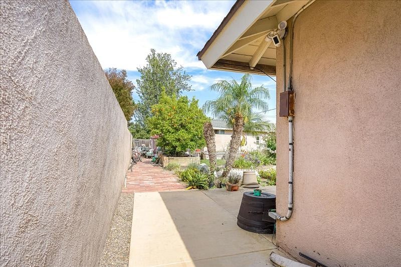 From Entry Gate, Walkway Leading To Back Yard Guesthouse
