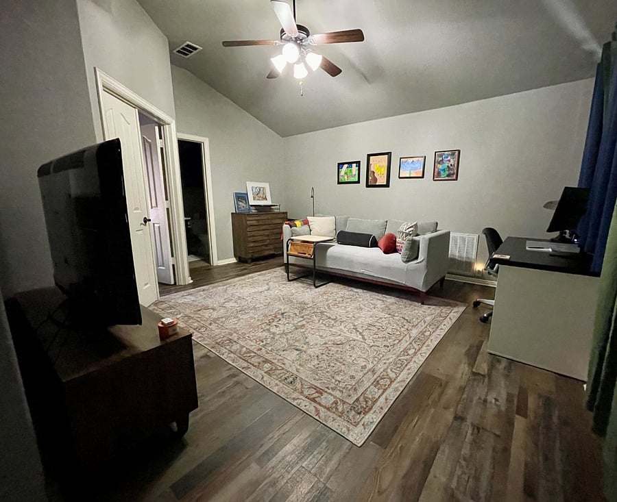 private living area, desk with monitor