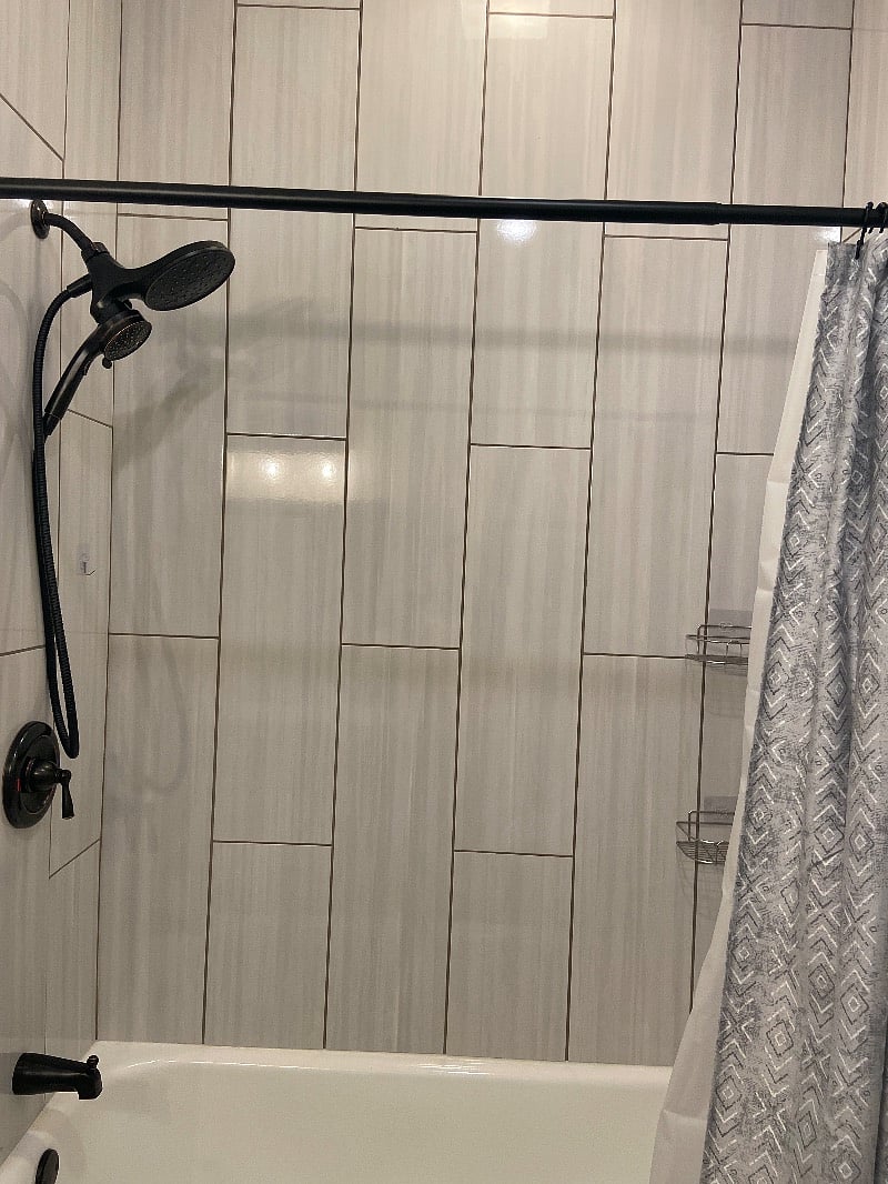 brand new tiled tub and shower