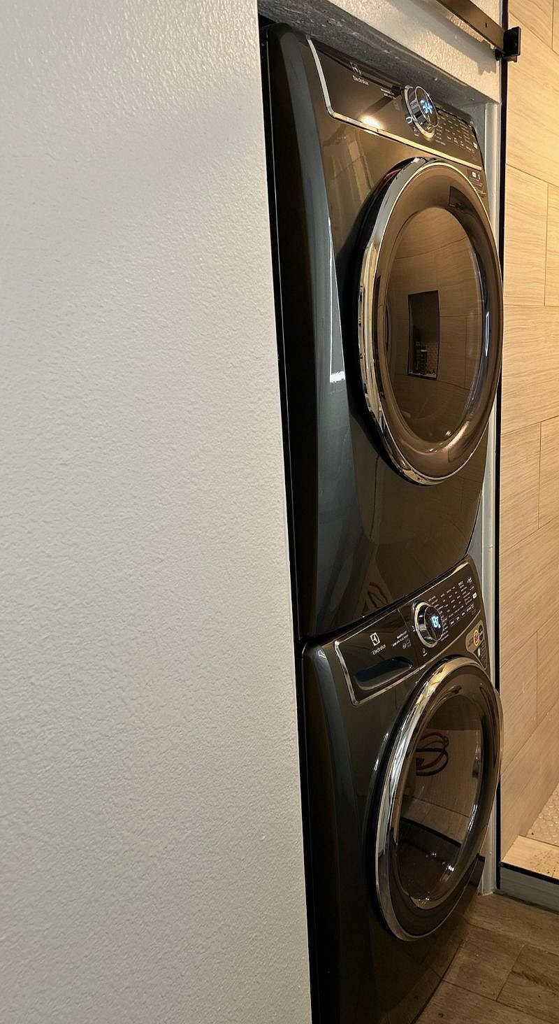 Washer and dryer in bathroom.