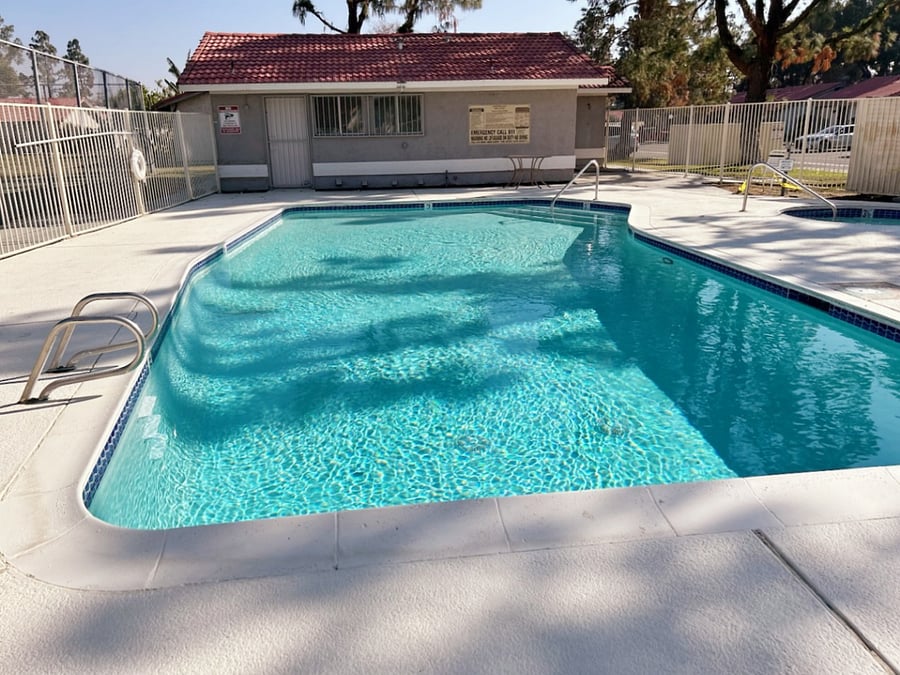 Pool (laundry room in background, you won't need it because we have new washer and dryer in unit).