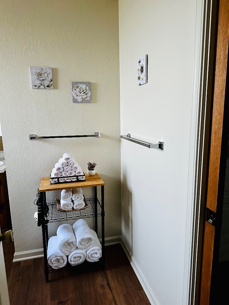 Bathroom, with access through right pocket door laundry, exercise, recreation room.