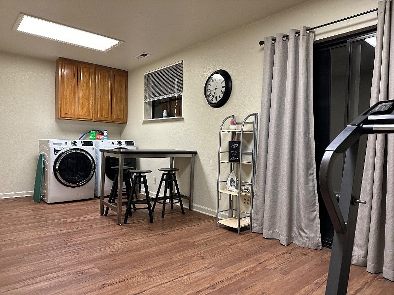 Laundry Room, exercise room, recreation area. Slider allows access to fully fenced yard, with patio including outdoor dining & seating with umbrella.