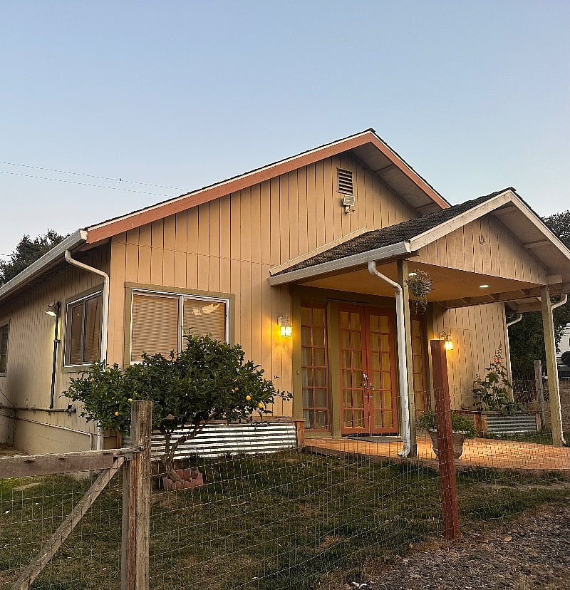 Exterior with fully fenced yard