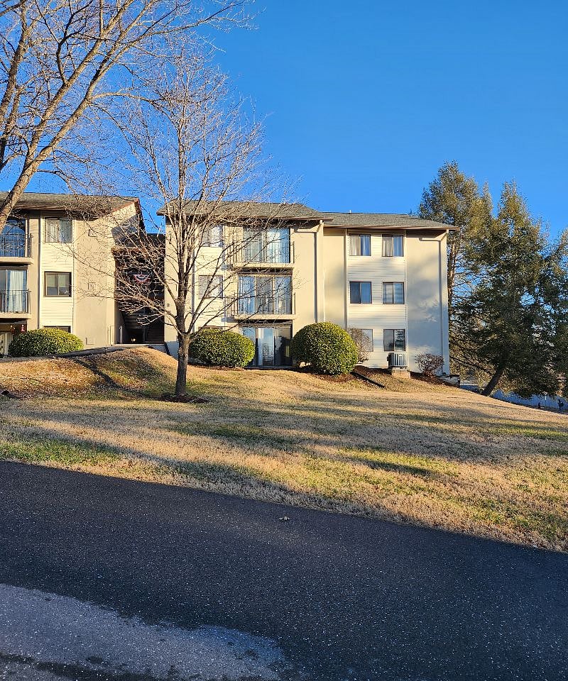 Front of condo... Steps down hill to bus stop