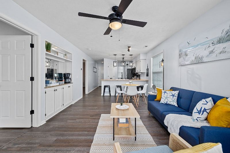 Bright living room that leads to a private patio