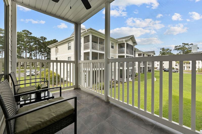 Enjoy your morning coffee or evening glass of wine on the screened-in patio with tile flooring