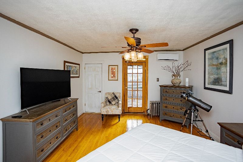Master bedroom door to the deck and master bath