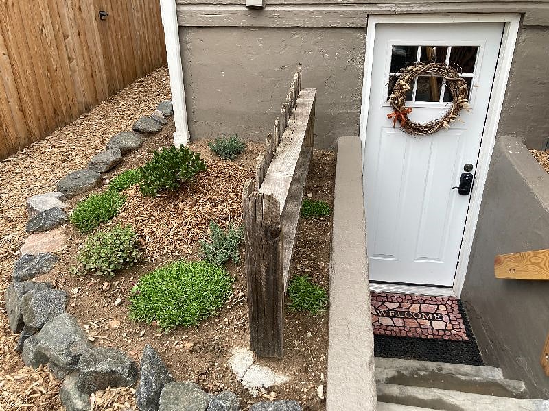 Separate garden level entry, with a code locking door.