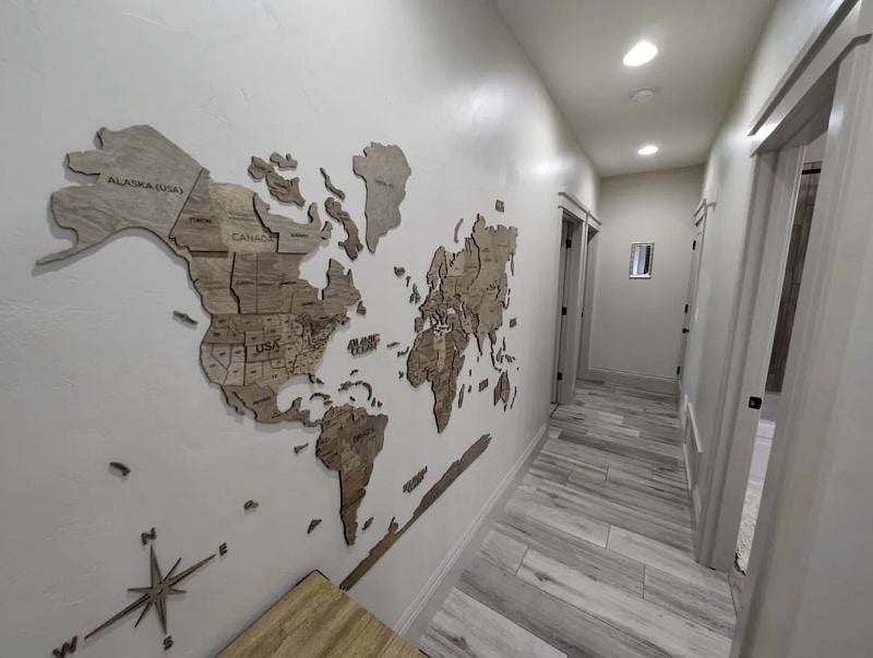 Hallway leading to private bedroom and bathroom from front door.