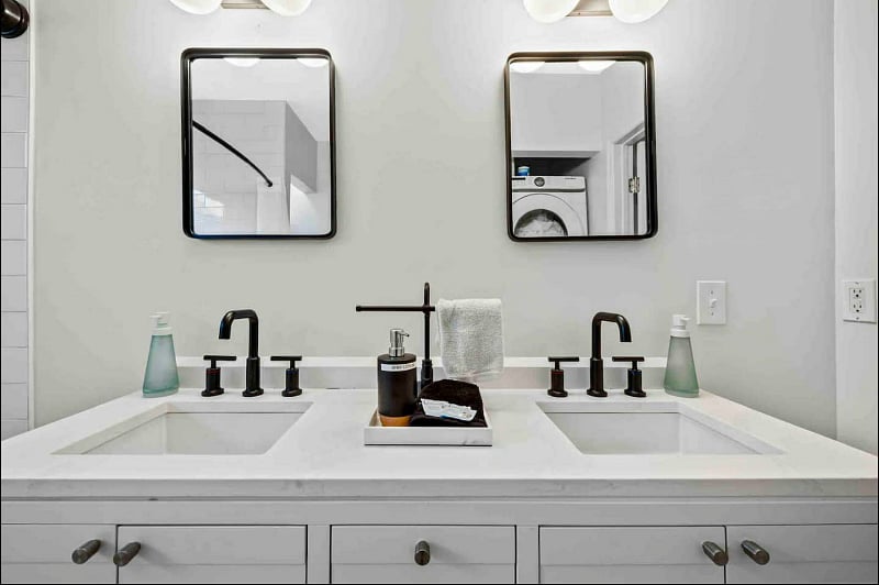 Bathroom with two separate vanities