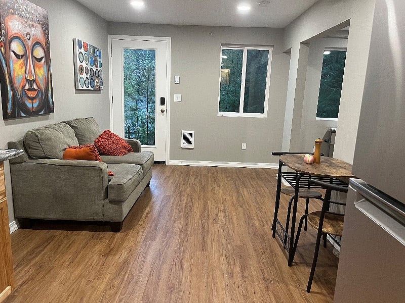 Living room area with views of the trees.