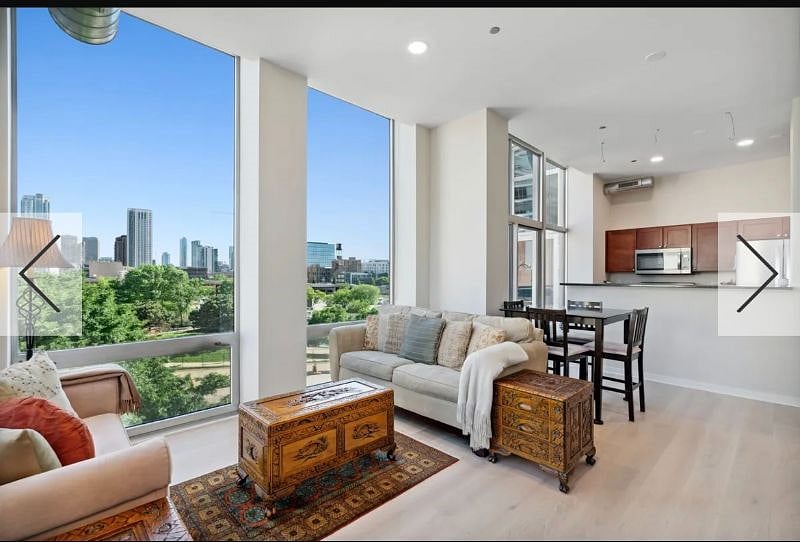 Cozy ambiance with natural light, loft-like high ceilings & lovely skyline views !