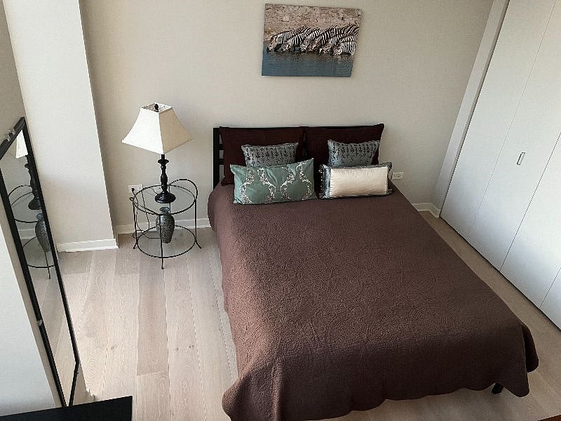 Your spacious cozy room with a wall of (2 tiered) ample closet storage!