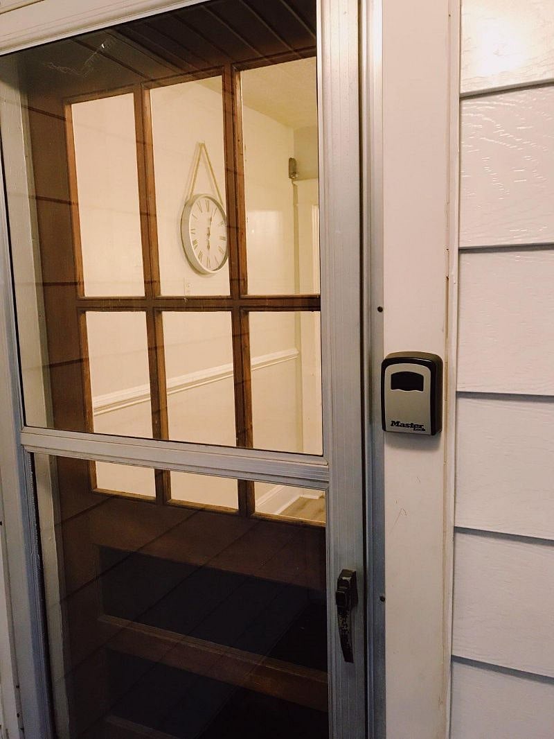 Back door with lock box for spare key