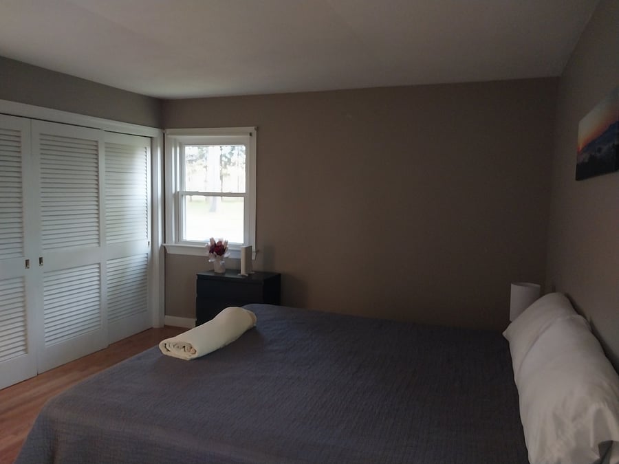 Master bedroom. King sized bed.