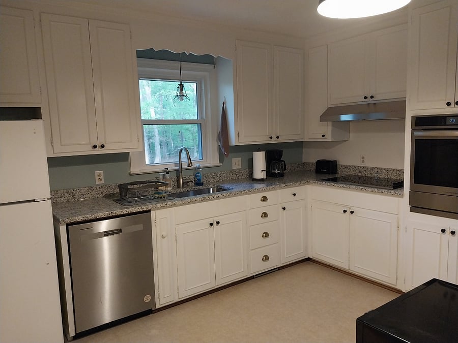 Kitchen appliances are all a few years old or less. The granite countertop was just installed.