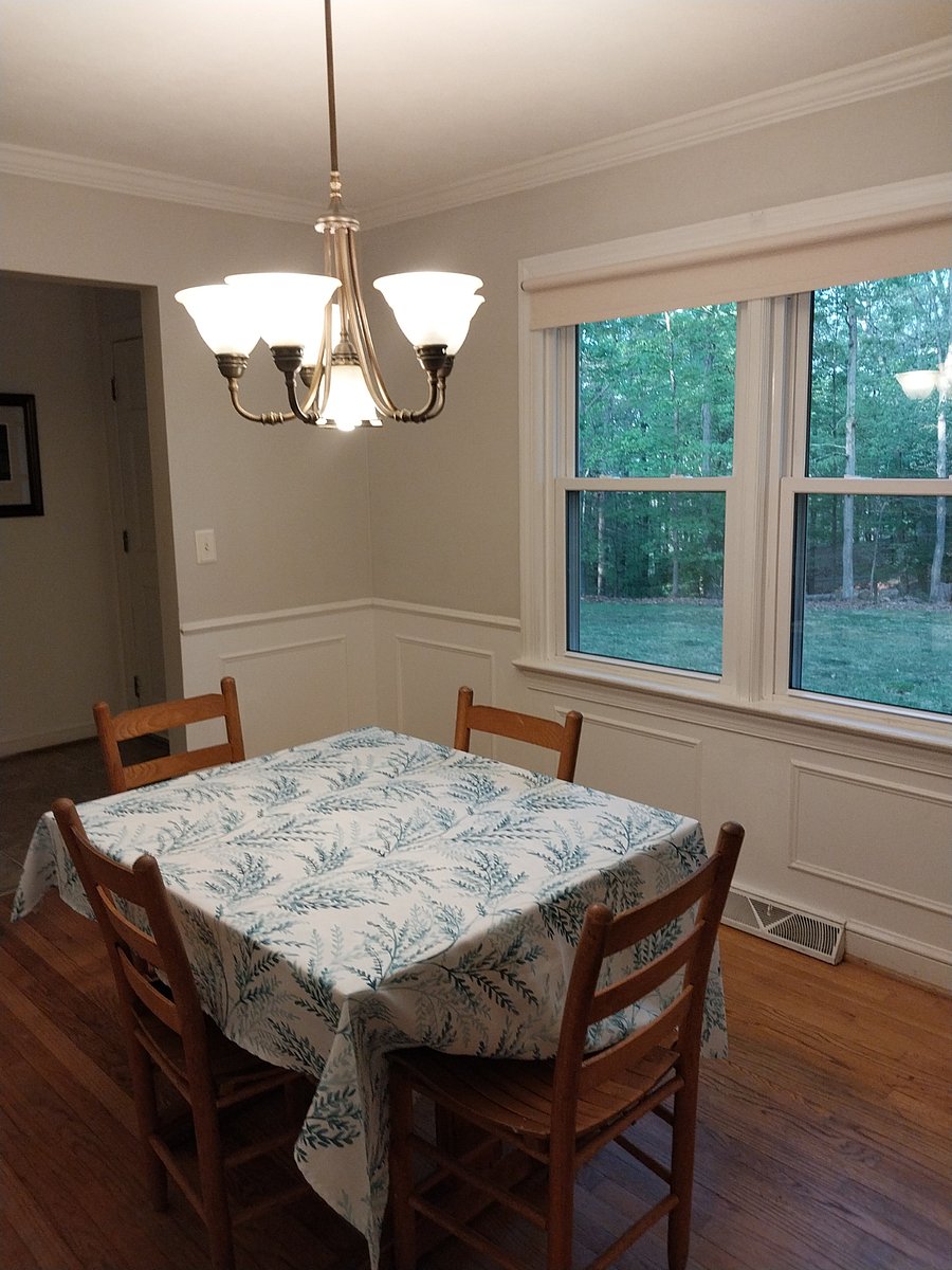 Dining room table seats four.
