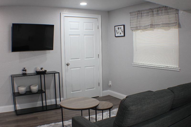 Livingroom showing large coat closet