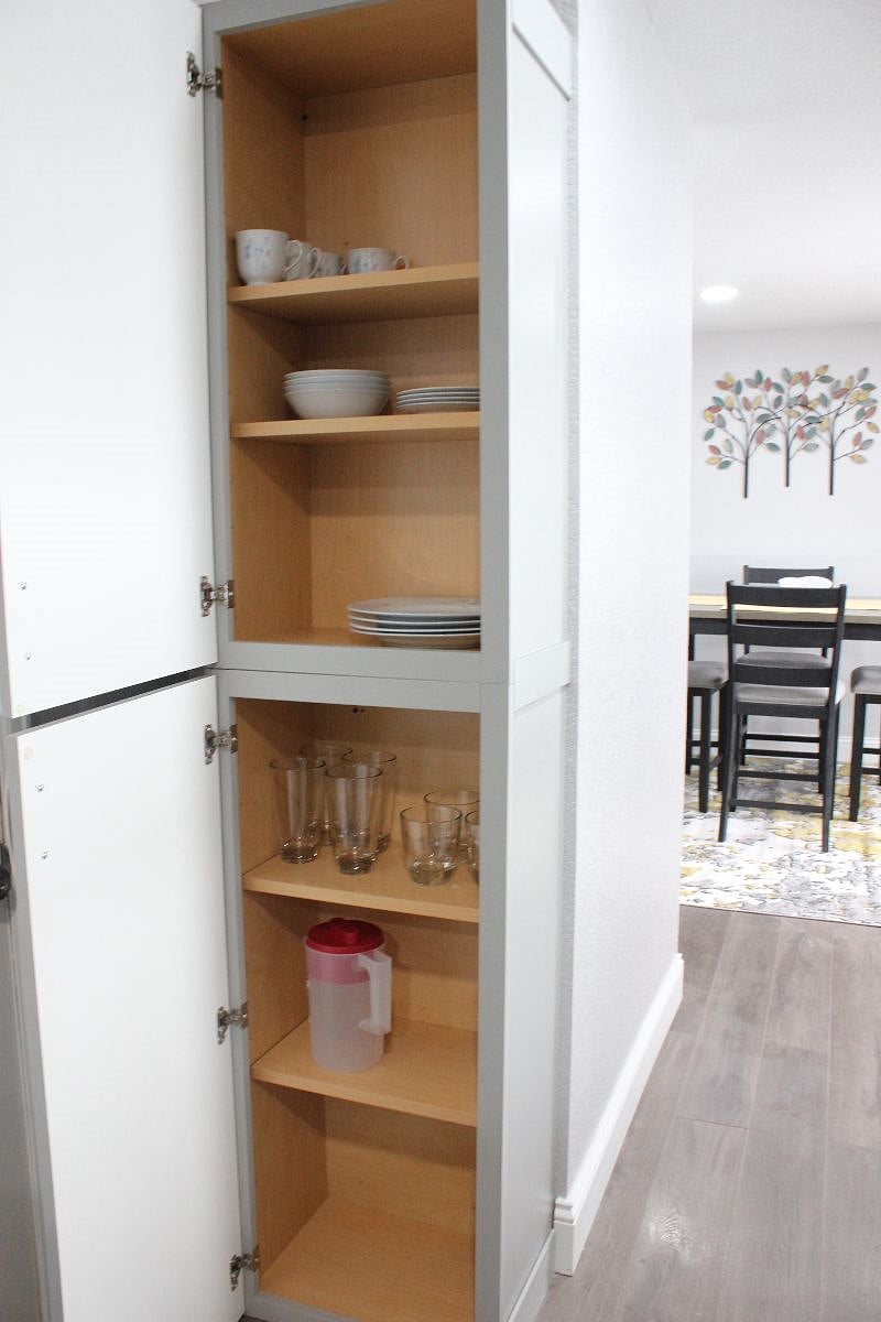 Full size cabinet with tableware