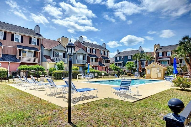 Pool is surrounded by adjacent units. Pool area is approximately 100' from this unit.
