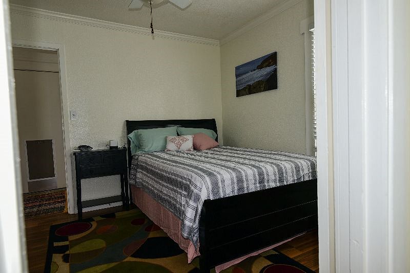 Bedroom 2 - Equipped with a full bed. This mattress is not new but clean and comfortable. 