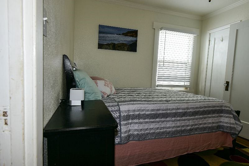 This room also has a bluetooth/alarm/light by the bed.