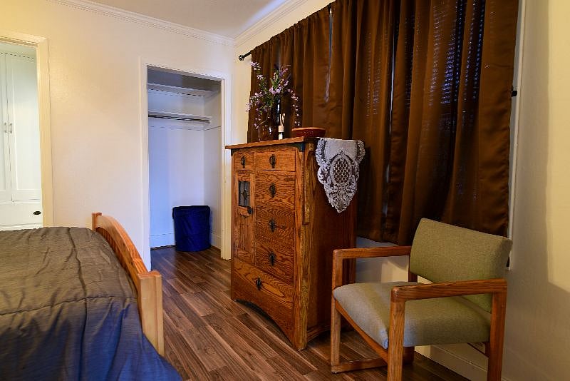 Bedroom 1 - queen bed, bluetooth/charge/moodlight/alarm, blackout curtains. 